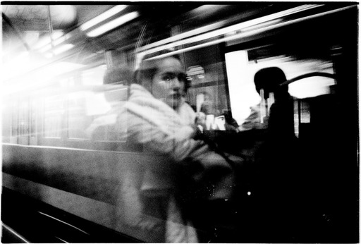 Woman staring on a train