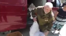 Russian commander to a father: "Sorry for your loss. Here's a bag of potatoes. Now smile for the camera."