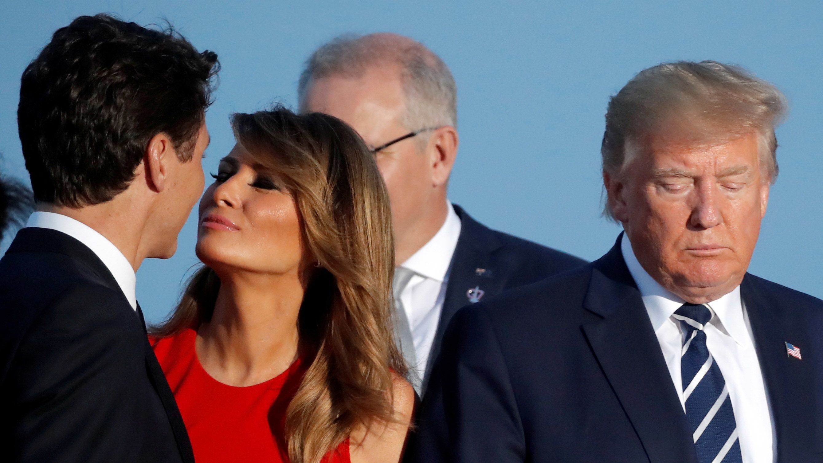 Melania Trump looking smitten with Trudeau, while Trump stands off to the side