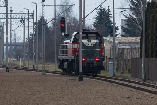 Newag 15DA shunting locomotive (modernized TEM2 soviet locomotive) in the distance