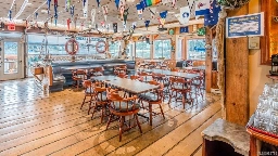 $4.8M listing in B.C. includes a house, a ferry and Canada’s only floating pub