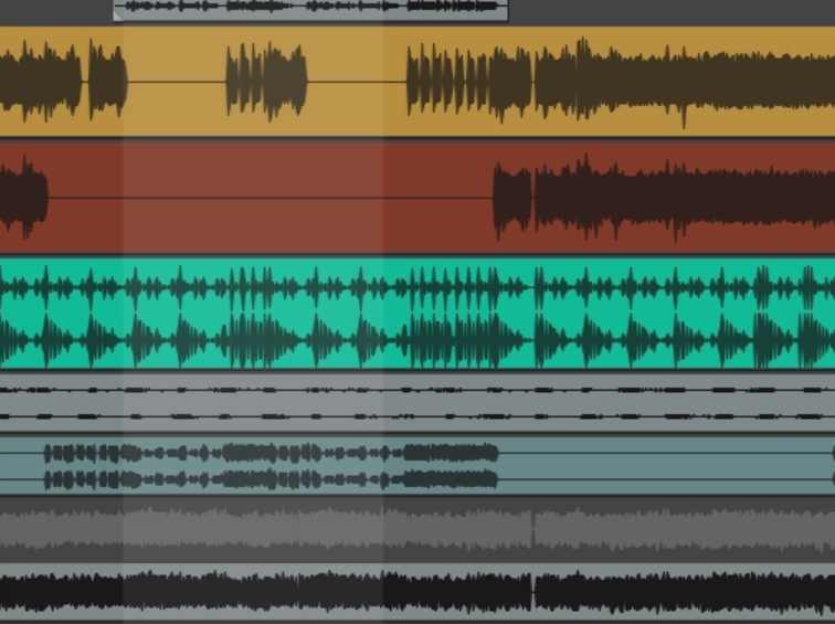 screenshot of a timeline in Reaper digital audio workstation. The rows have different colors and display soundwaves