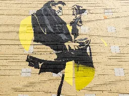 PHOTOS: Johnny Cash, London and the making of a downtown mural