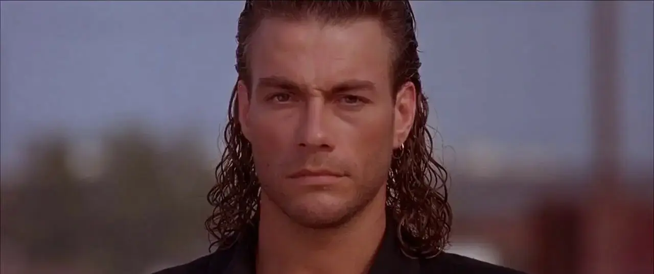 Still from 1993 movie Hard Target, showing Jean-Claude Van Damme and his mullet