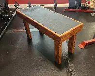 A wood bench made from scraped pallets