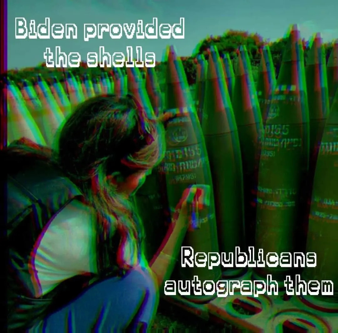 a person with long hair is signing a large artillery shell. There is a red/green filter above the image creating an effect similar to how cheap "3d" looks without the glasses. the caption reads: "Biden provides the shells - Republicans autograph them"