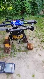 An octocopter carrying an anti-tank mine.