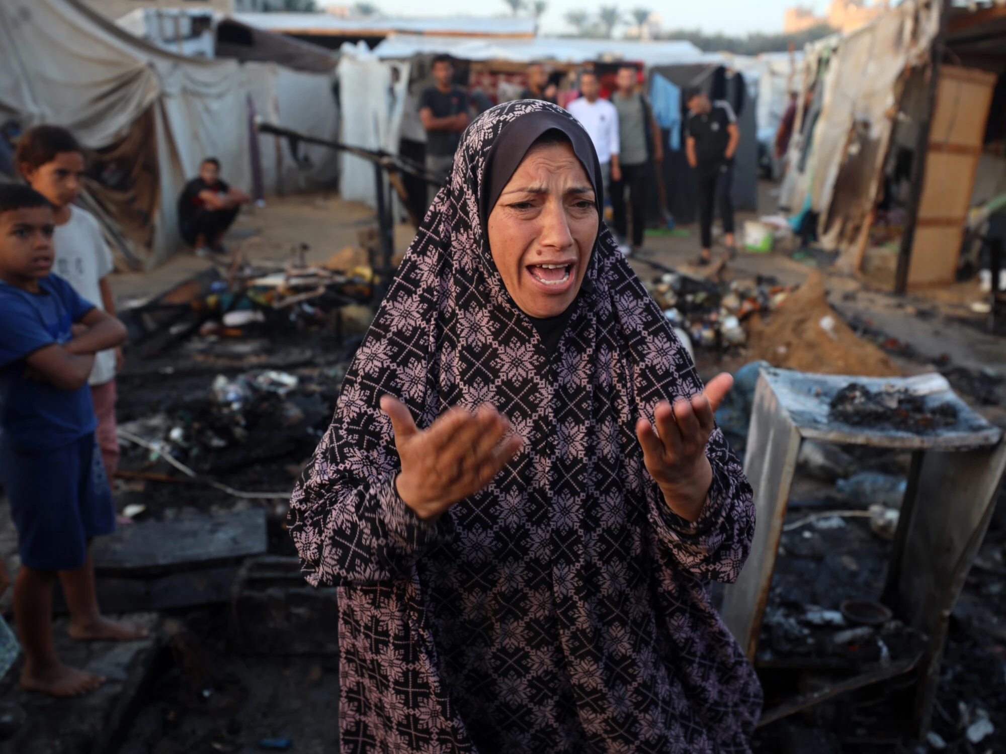 Live: Palestinians burn to death after Israeli strike on Gaza hospital sets tents on fire